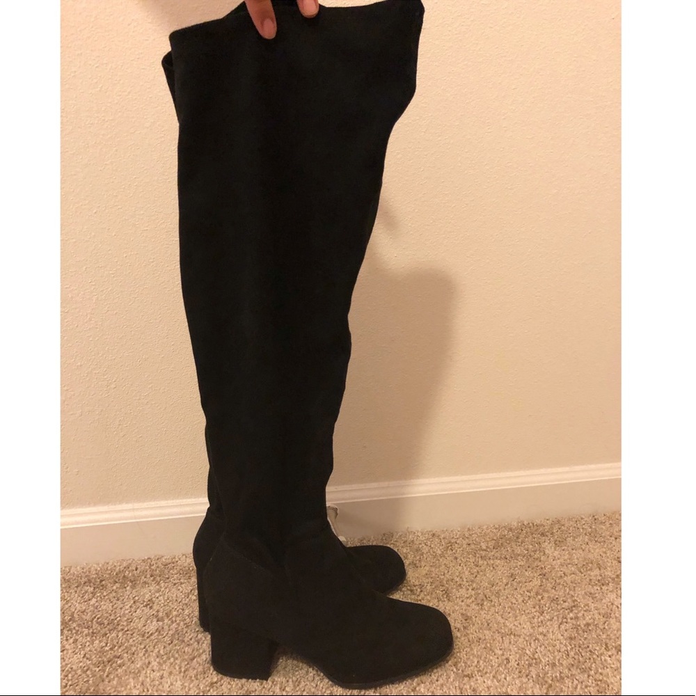 Thigh high black boots